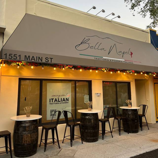 Trattoria Bella Napoli storefront and sidewalk seating on Main Street in downtown Sarasota.