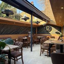 Una foto del restaurante Dion’s Lounge