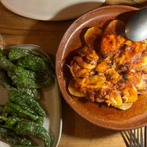 Foto von Simunye Ginebra Restaurant