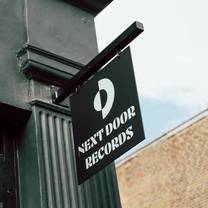 Een foto van restaurant Next Door Records