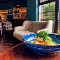 Una foto del restaurante The Riverside Cottage