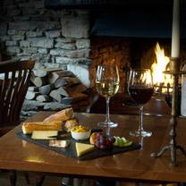 Foto von The Old House at Home Restaurant