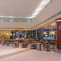 Restaurants near Escapade 2001 Dallas - Cool River Cafe - Main Terminal - DAL Airport