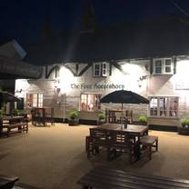 Une photo du restaurant The Four Horseshoes