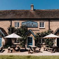 A photo of The Cat and Custard Pot restaurant