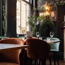 Una foto del restaurante The Clerk & Well
