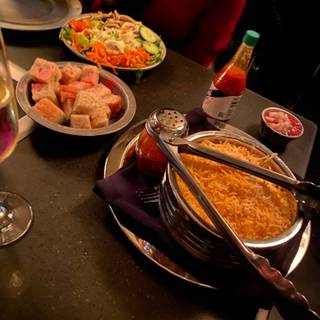 Sampling of the Entire Fondue Menu and Wine for Two or Four at La Fondue  (Up to 61% Off)