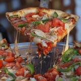 Cover image for The Kitchen Italian Cafe and Pizzeria