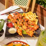 Cover image for Garden House Latin Restaurant