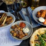 Cover image for Woodie Fisher Kitchen + Bar