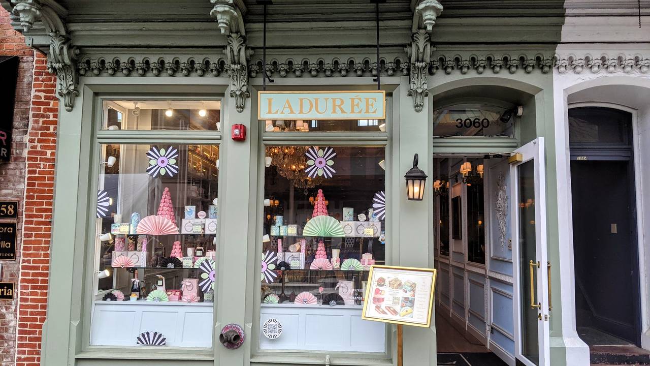 PARIS, FRANCE - JUNE 12, 2015: People In Front Of LADUREE Shop At