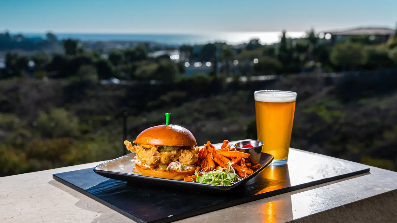 Fried chicken sandwich and beer with ocean view - Canyons at The Crossings, Carlsbad, CA
