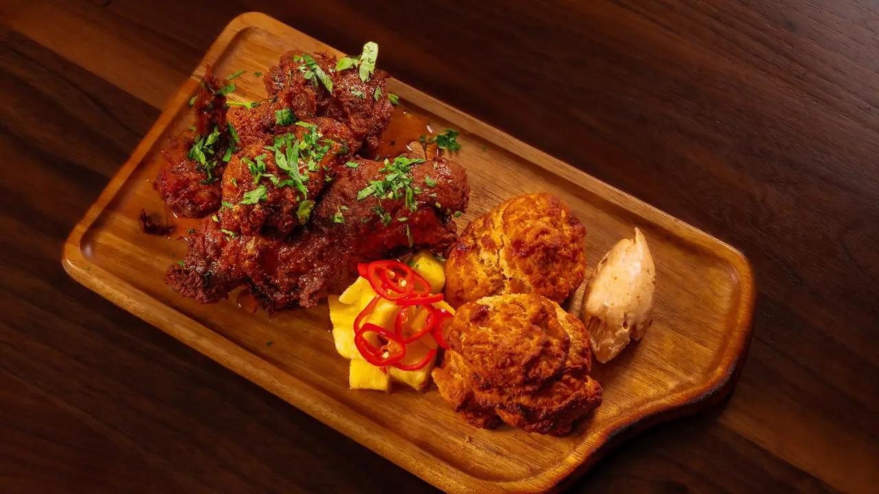 Fried Yardbird & Biscuits with Hot Honey Fried Yardbird & Biscuits with Hot Honey - Red Rooster Overtown, Miami, FL