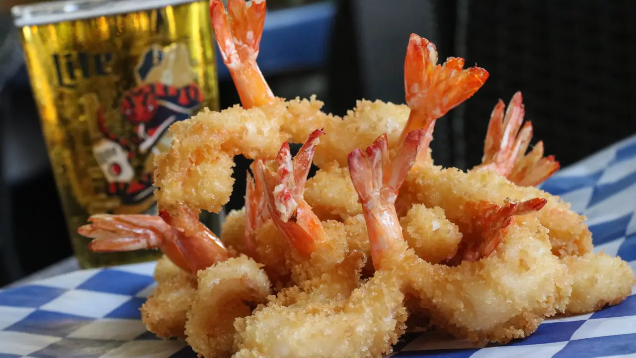 Hand battered fried shrimp with an ice cold beer
 - The Reel Seafood & Grill, New Braunfels, TX