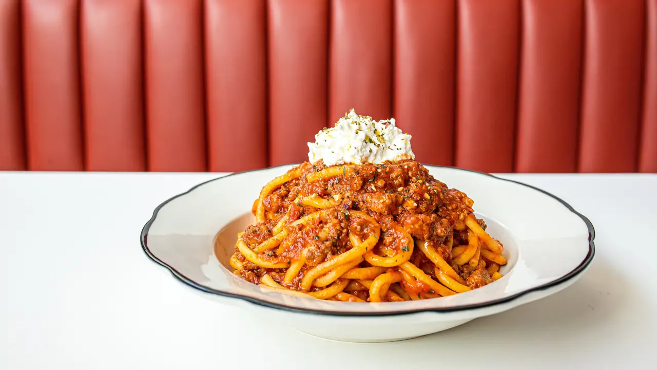 Our Signature Bucatini with Spicy Neapolitan Ragu - Caruso's Grocery - DC, Washington, DC