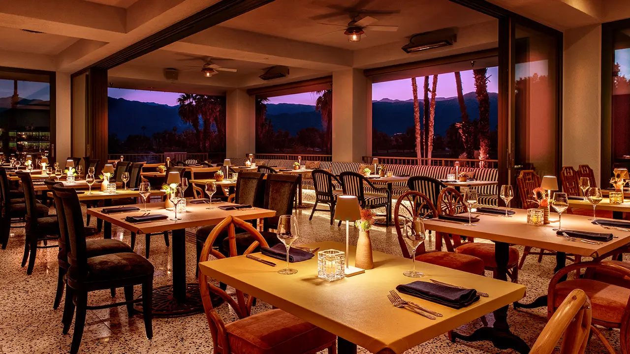 The indoor/outdoor dining room with mountain views - The Penney & Parlour, Rancho Mirage, CA
