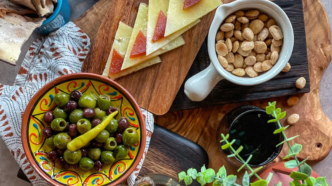 Tapas of olives, Marcona almonds &amp; cheese      - Tablas Woodstone Taverna, Mill Creek, WA