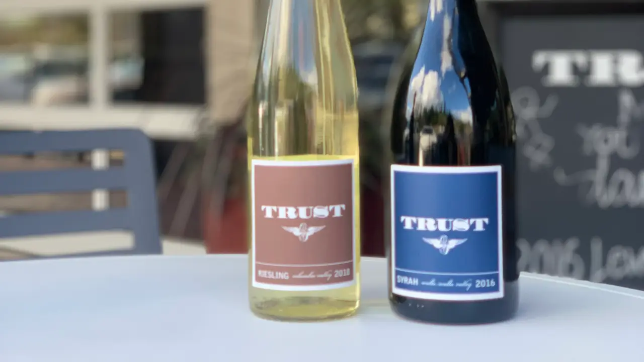 Bottles of Trust Cellars Riesling and Syrah  - Trust Cellars, Woodinville, WA
