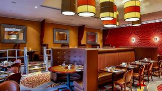 A photo of Allgauer's Restaurant - Doubletree Hotel restaurant