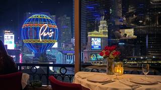 The view from the Eiffel Tower Restaurant at the Paris Hotel and Casino of  the Bellagio on the other s…