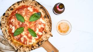 Pizza + Peroni $20. Aperol Spritz $12 photo