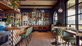 A photo of Doughbird Pizza & Chicken – North Central restaurant