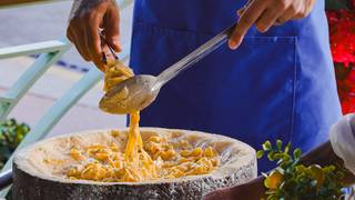 Pasta in Cheese Wheel - Table side Presentation photo