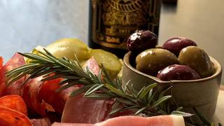 Bottle of Wine with Charcuterie or Cheese Plate photo