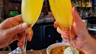 Bottomless Mimosas to keep the good times flowing! photo