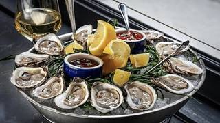 $1.50 OYSTERS EVERY FRIDAY AND SATURDAY photo