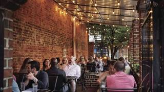 Cozy Outdoor Dining at Spotted Cow Steakhouse photo