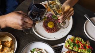 Enjoy 1/2 off bottles of wine all July long! Photo