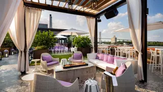 A photo of Myrtle & Rose Rooftop Bar at Plant Riverside District restaurant