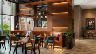 A photo of FireLake Grill House at Radisson Dubai DAMAC Hills restaurant
