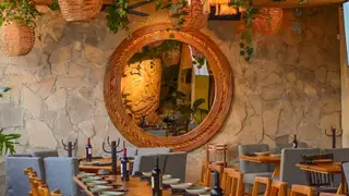 Una foto del restaurante Tikal Grill House Colosio