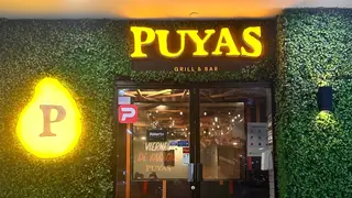 Una foto del restaurante Puyas Grill Y Bar