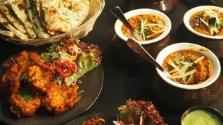 Foto von Strand Tandoori Restaurant