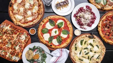 The Pizza At This Delicious New Jersey Eatery Is Bigger Than The