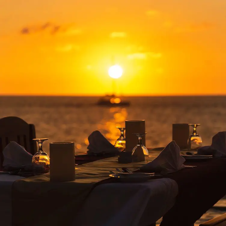 The Blue Mahoe Restaurant at the Ocean Cliff Hotel Negril - Negril ...