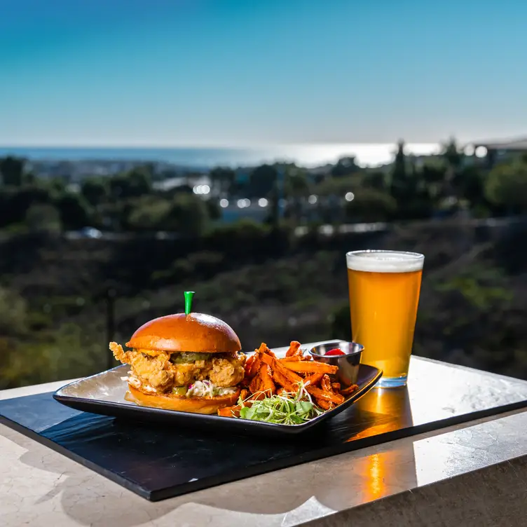 Fried chicken sandwich and beer with ocean view - Canyons at The Crossings, Carlsbad, CA