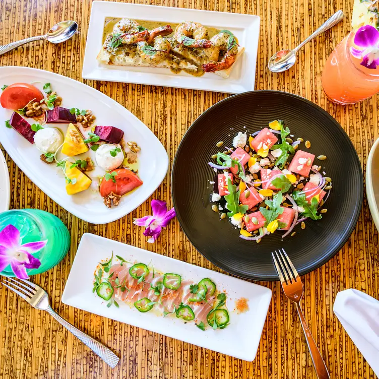 The menu features island-inspired flavors. - Sea House Restaurant at Napili Kai Beach Resort, Lahaina, HI