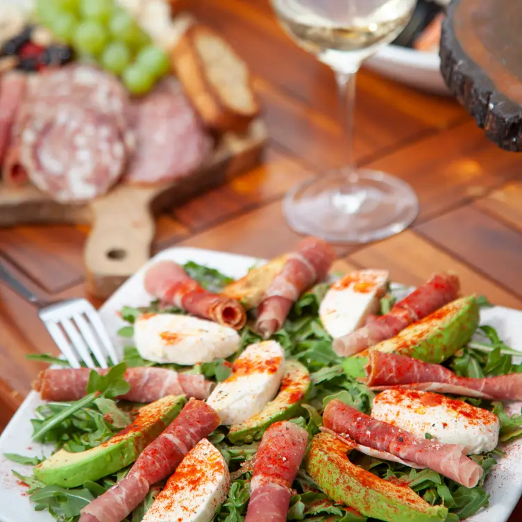 Italian cuisine on patio wine, salad, charcuterie - Slice of Italy CO Snowmass Village