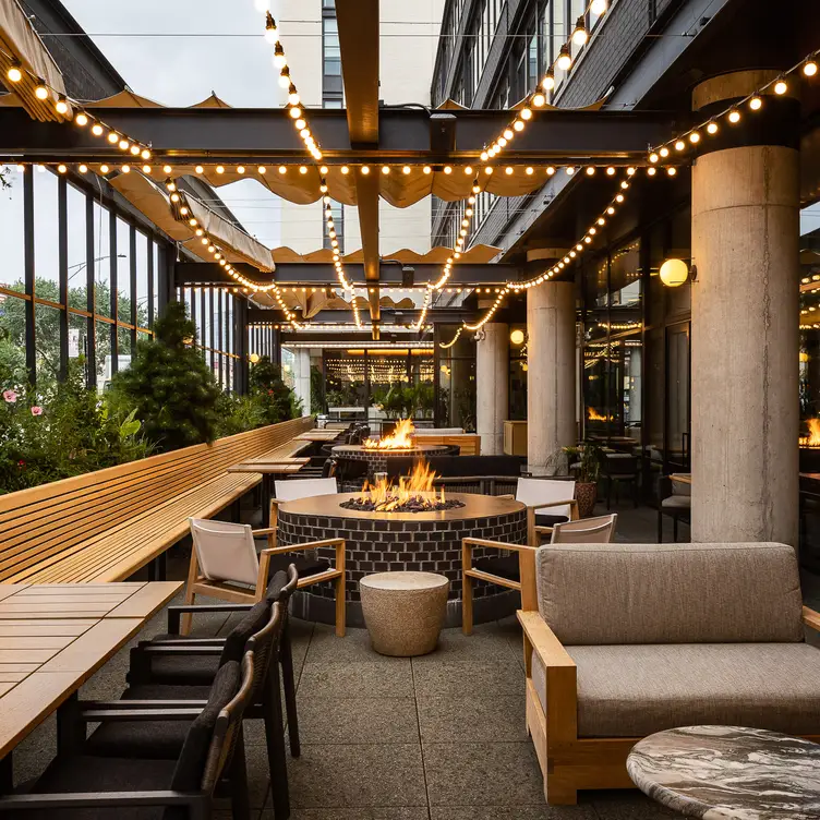 Our favorite spot - the heated patio. - Fora, Chicago, IL