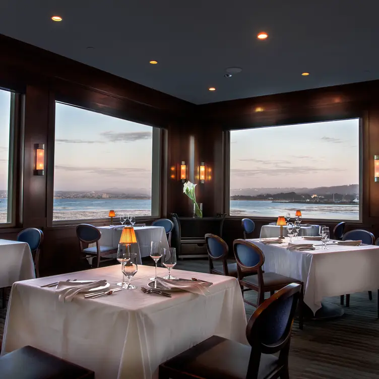 Elegant dining room suspended over the Bay - Coastal Kitchen Monterey, Monterey, CA