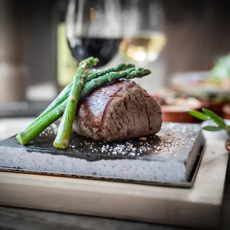 Quality steaks on hot lava stone.  - STONEAGED at The White Swan, Henley-in-Arden, Warwickshire