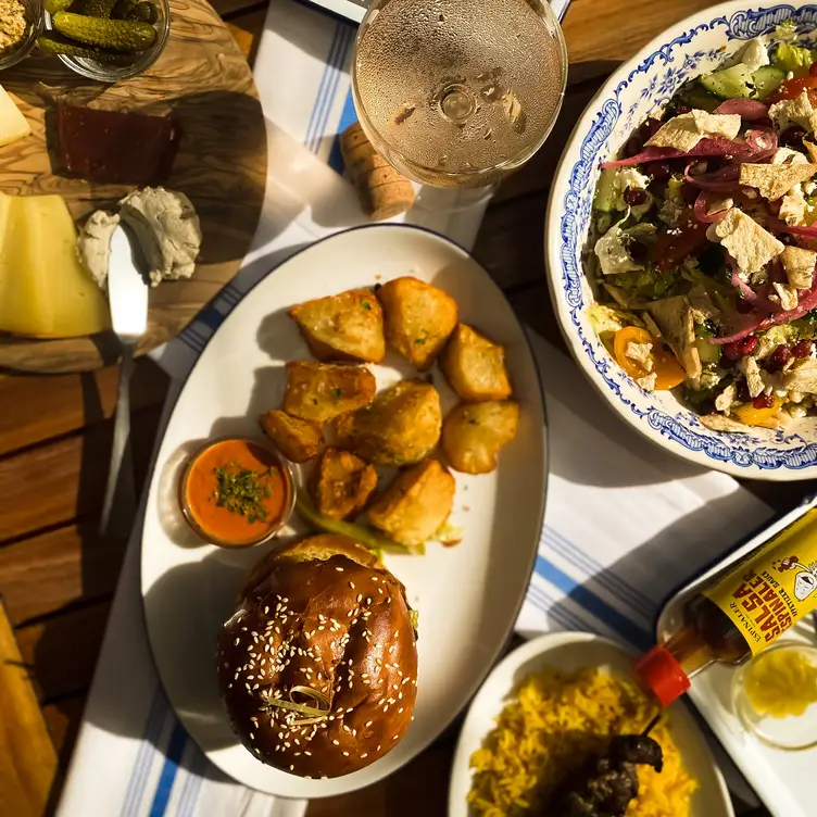 Dinner spread available on our outdoor patio. - Agnes Café & Provisions, Houston, TX