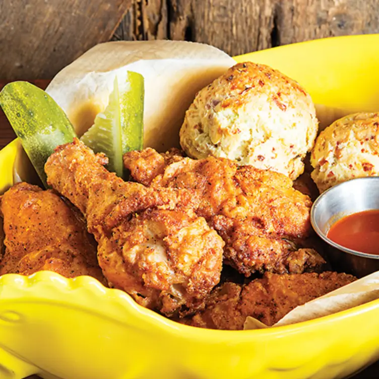 Fried Chicken, cheddar chive biscuits, hot honey - Showroom MD Frederick