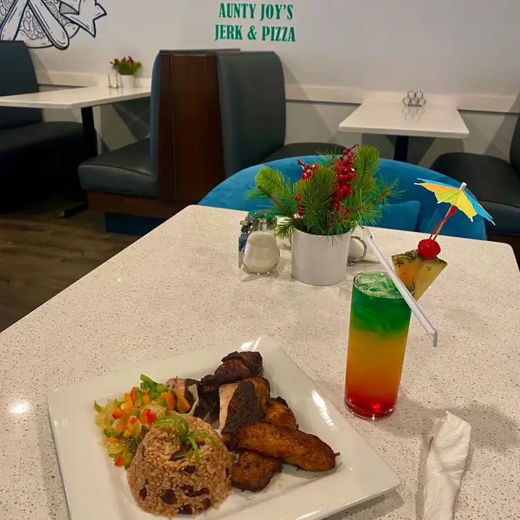 Signature Bob Marley cocktail &amp; Jerk Chicken Meal - Aunty Joy's Jerk & Pizza, Chicago, IL
