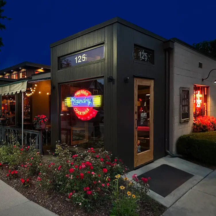 main entrance with with neon sign at dusk - The  Laundry - Fenton, Fenton, MI