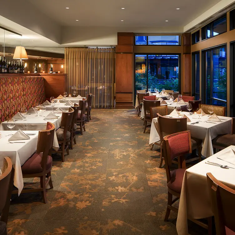 Row of two-top and four-top dining tables in JORY. - JORY Restaurant at The Allison Inn & Spa, Newberg, OR